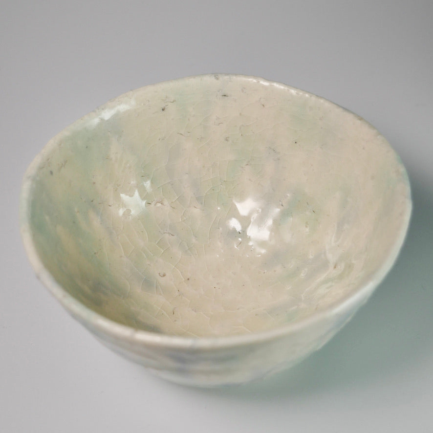 Blue-green glazed teacup