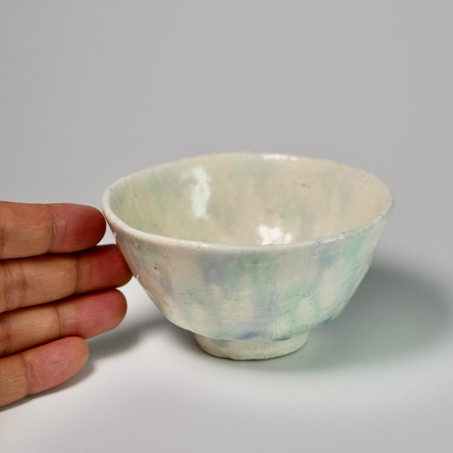 Blue-green glazed teacup