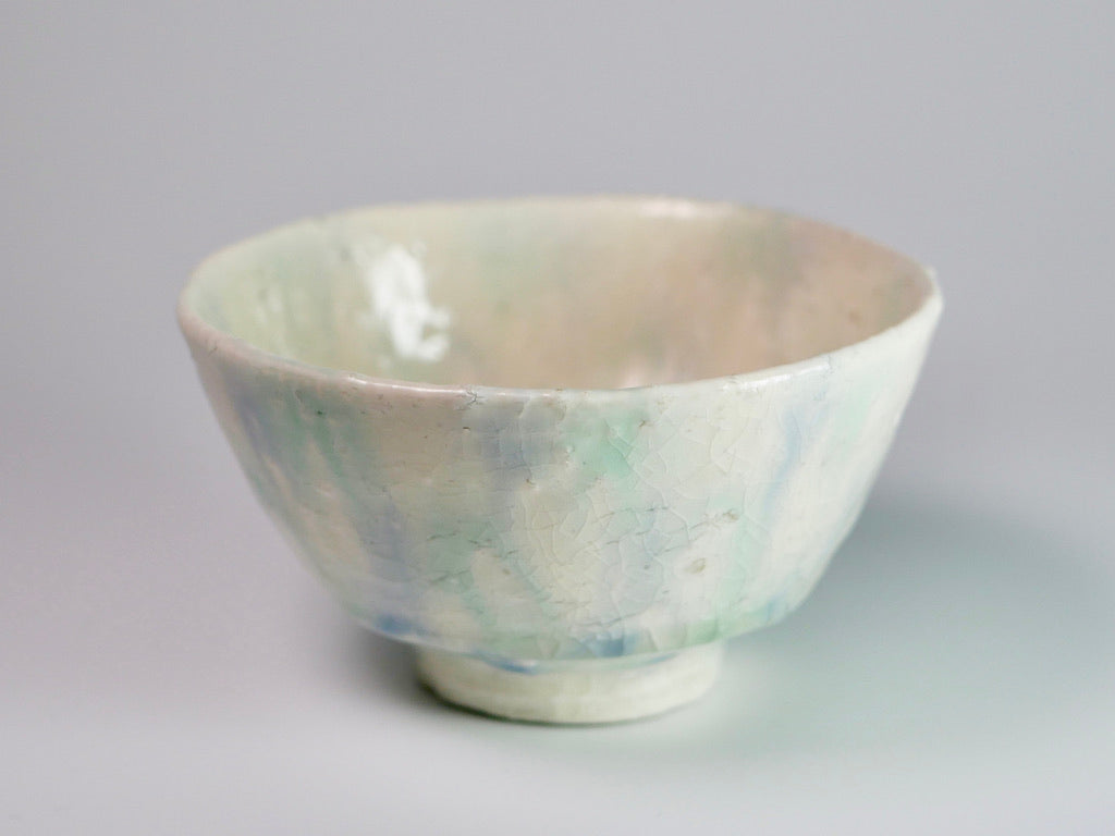 Blue-green glazed teacup