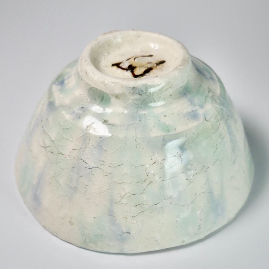 Blue-green glazed teacup