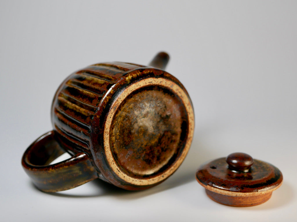 Iron-colored engraved teapot