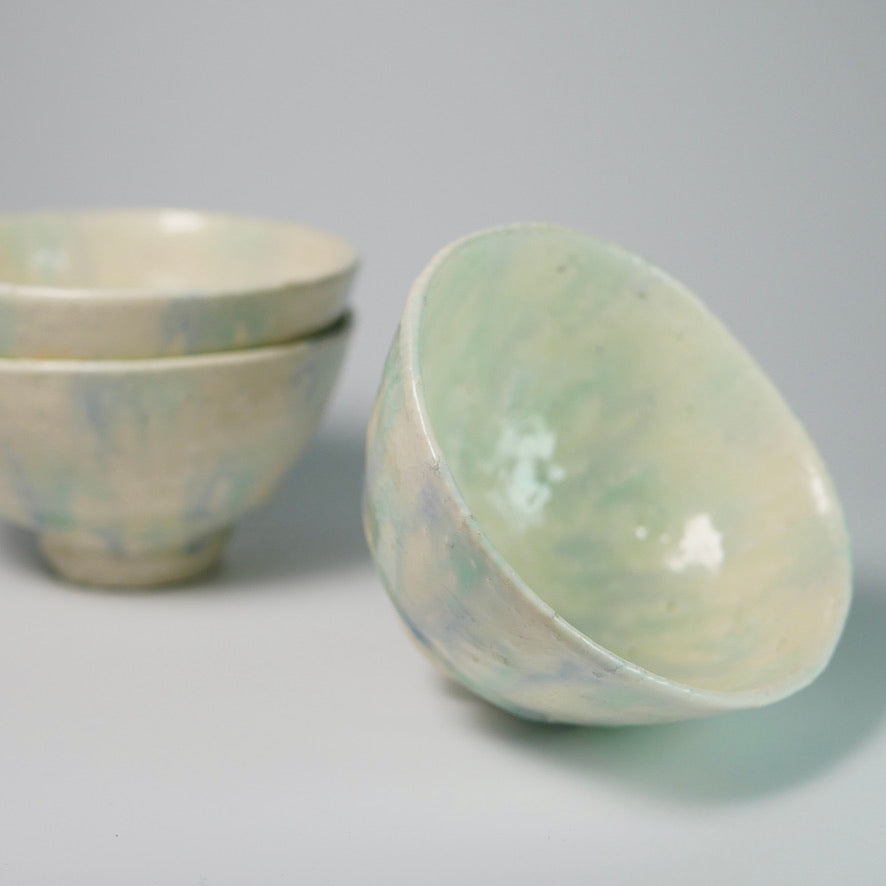 Blue-green glazed teacup